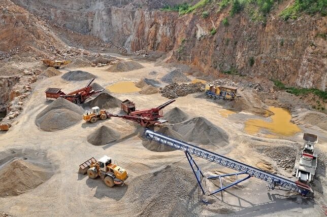 Heavy machinery operating during mineral extraction in Iran
