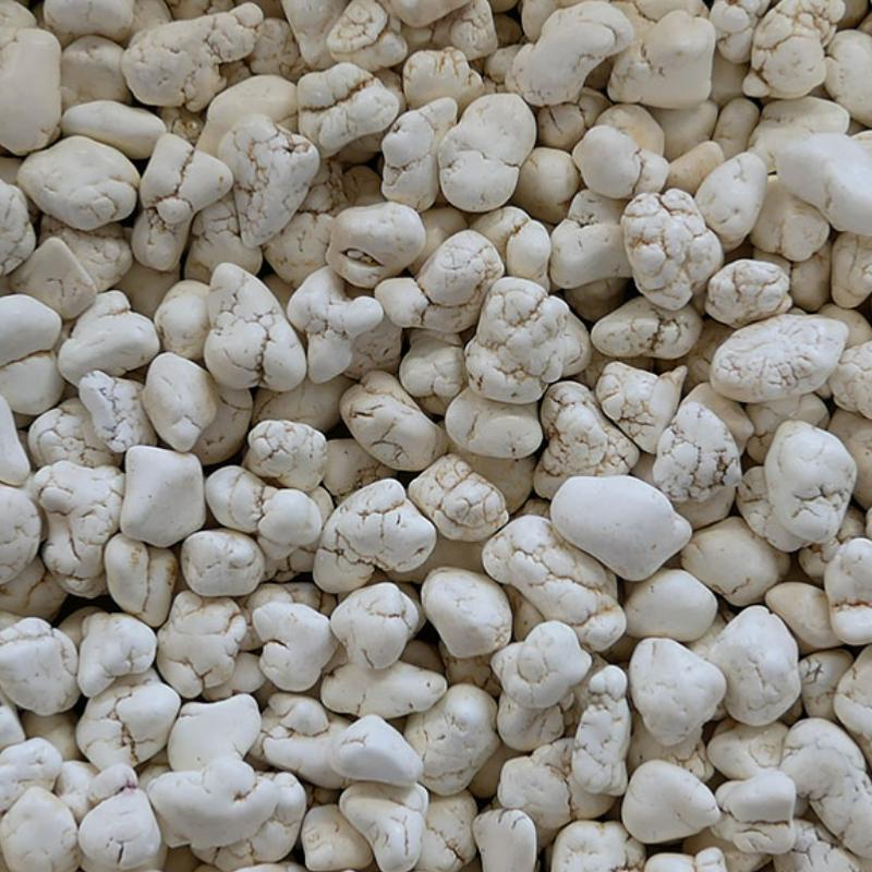Raw Iranian magnesite lumps – high-purity magnesium carbonate mineral used in refractory and steel industries