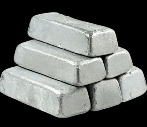Close-up of aluminum ingot showing smooth metallic surface and uniform shape